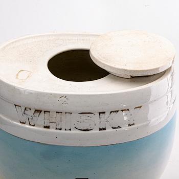 A porcelain whisky-barrel around 1900.