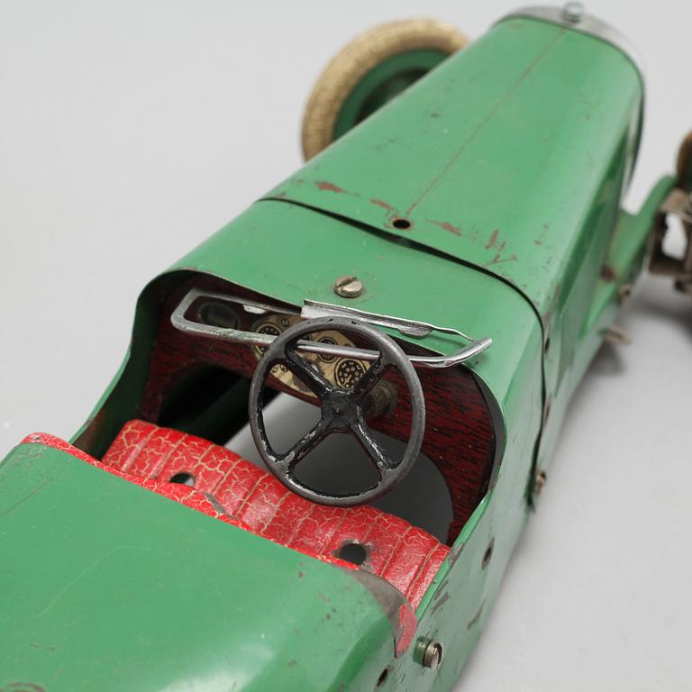 Three toys from Meccano and Schuco, around the mid 20th century.