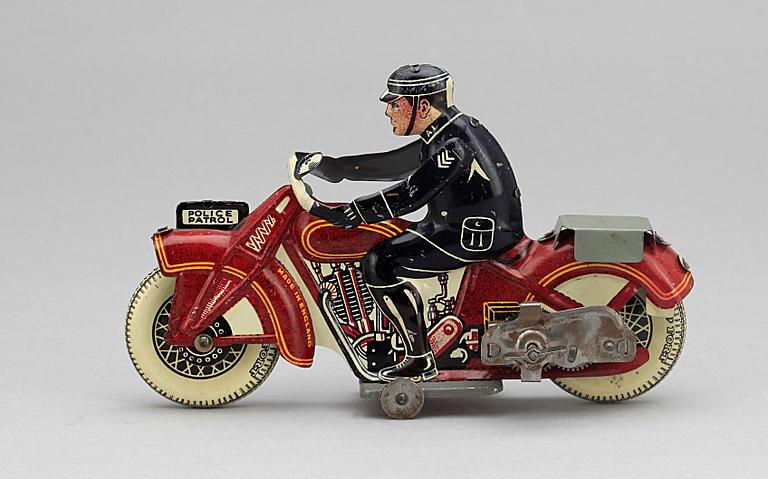 POLISMOTORCYKEL, plåt, Mettoy, England, 1930-tal.