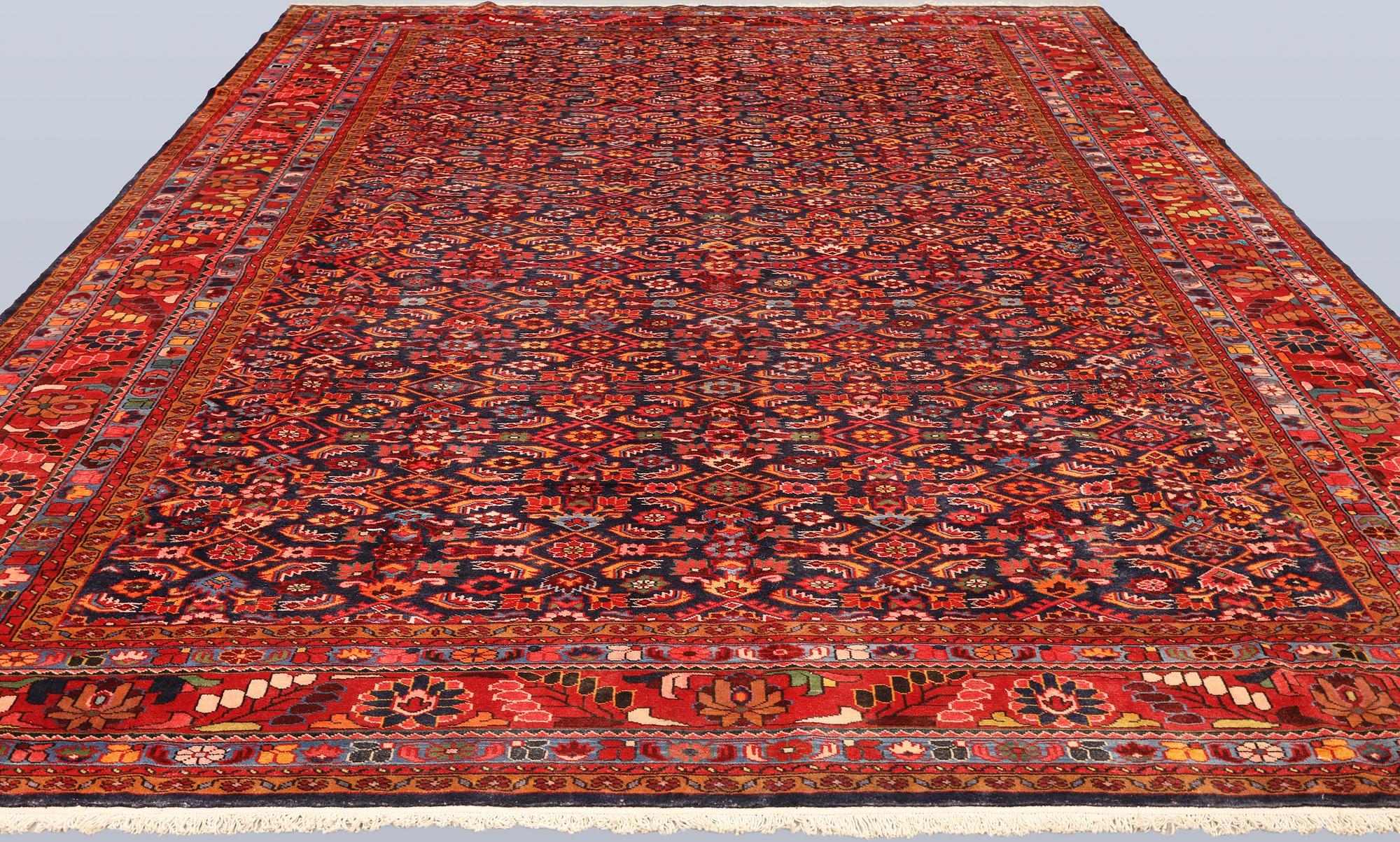 A semi-antique Lilian carpet, approx. 429 x 297 cm.