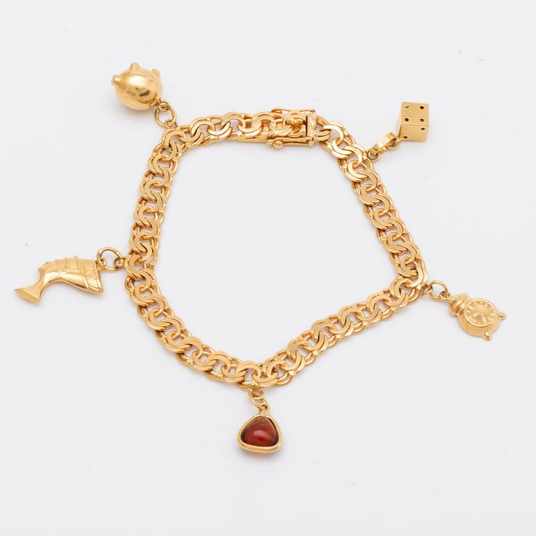 Bracelet, 18K gold with charms, approx 19 x 0,6 cm, 19,6 g, Borgings Guldsmide Göteborg 1962.