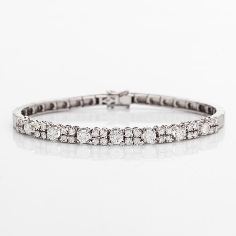 Armband, 14K vitguld med briljantslipade diamanter, Importstämplad A. Tillander 1975.