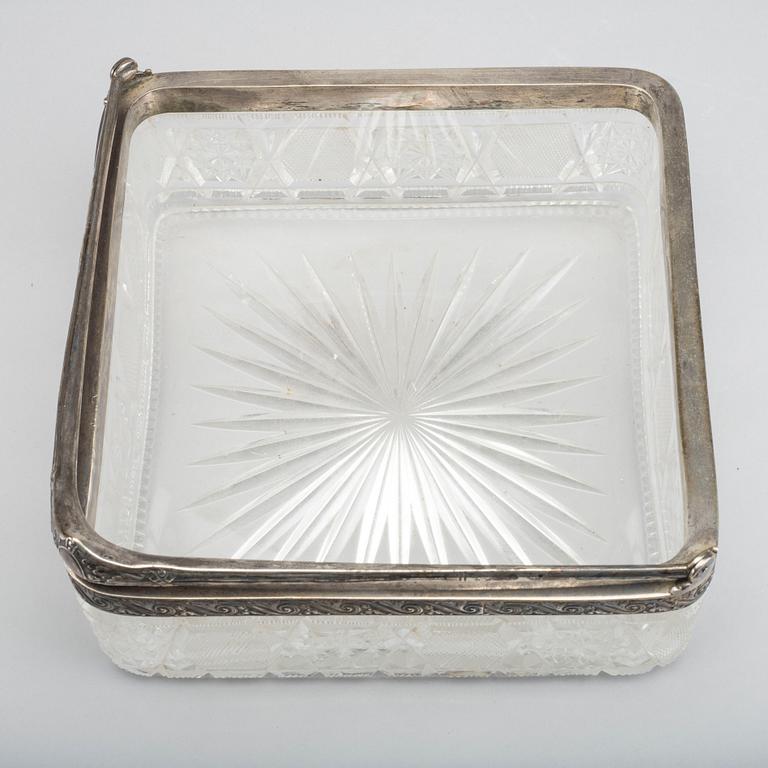 A GLASS BOWL AND SILVER PLATE.