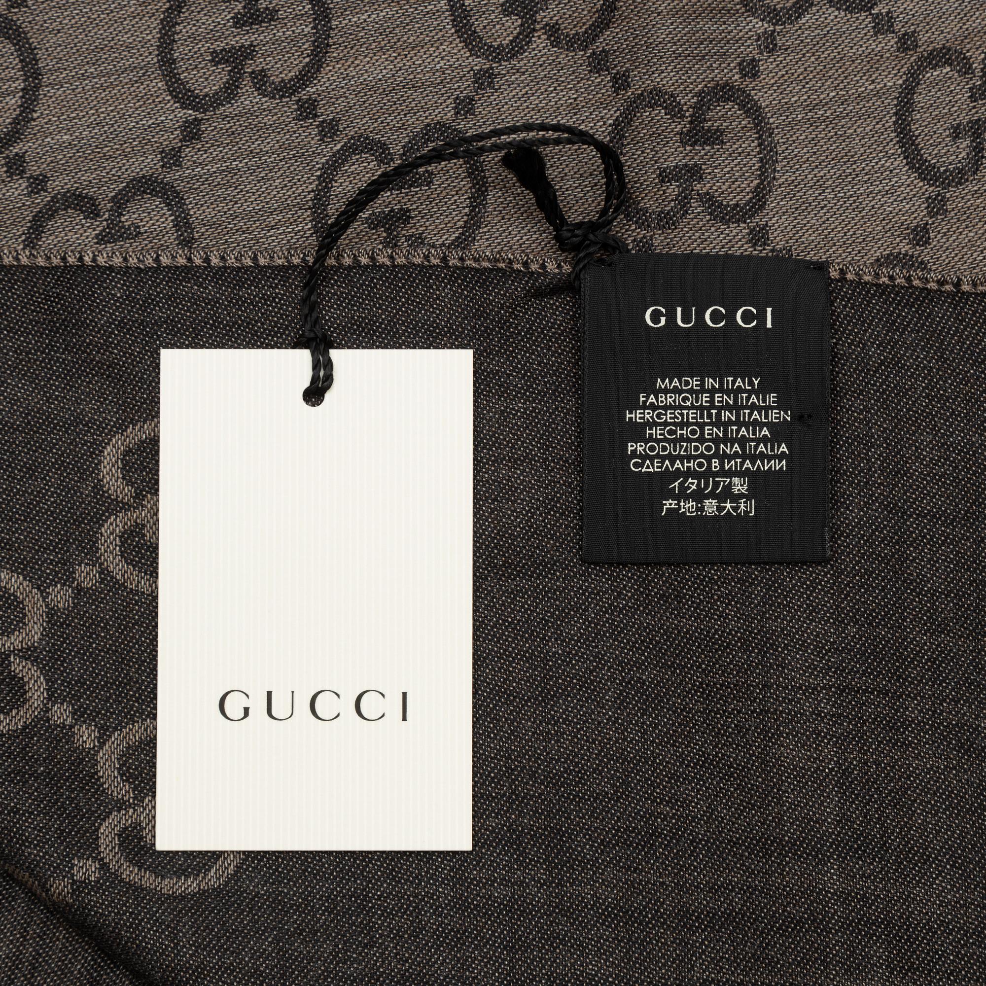 Gucci, a wool and silk mix "GG" jaquard shawl.