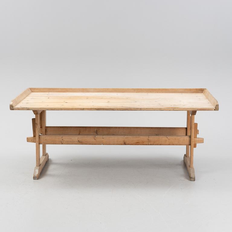 A pine baking table, 19th Century.