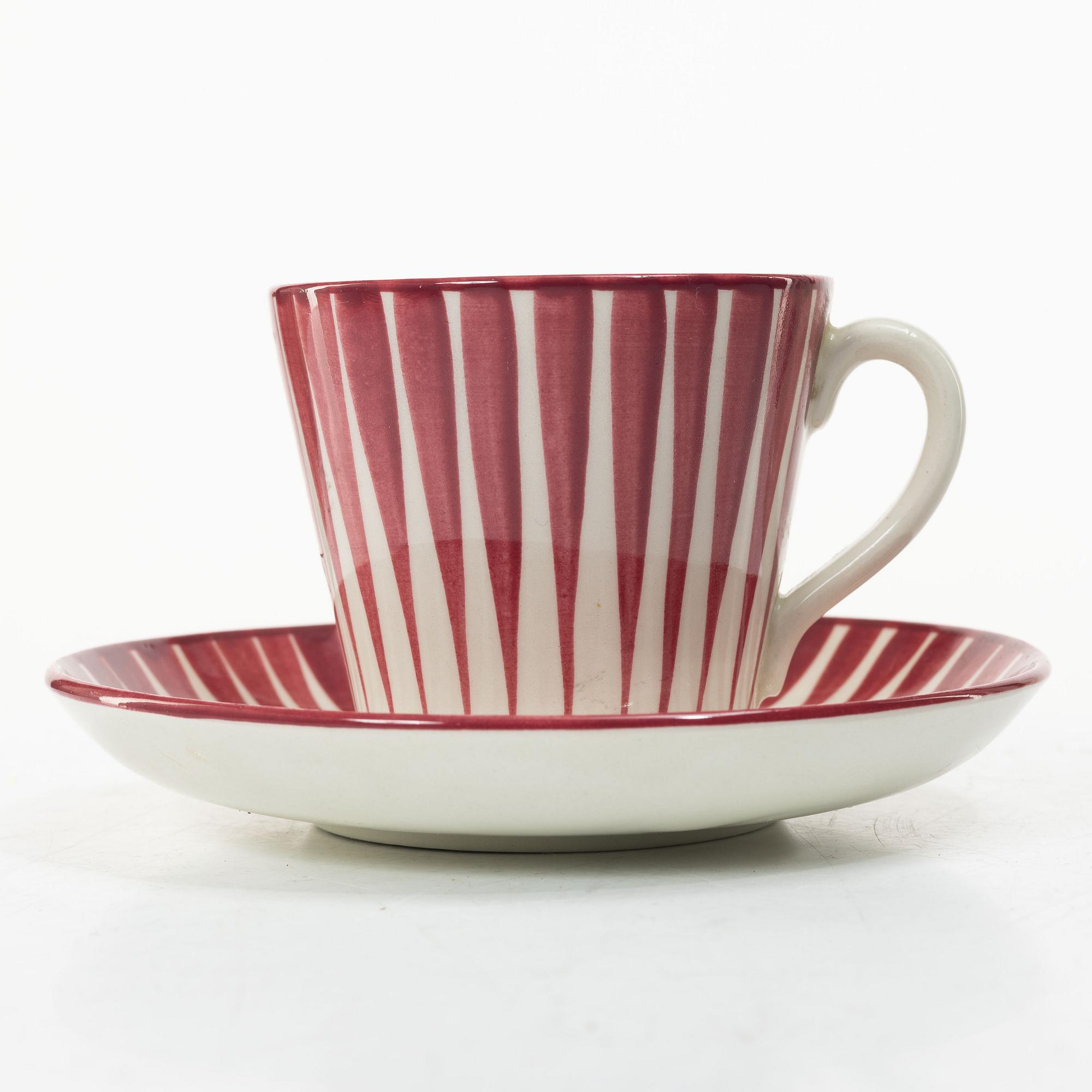 Eugen Trost, Three 'Red Zebra' cream-ware coffee cups on saucers, Uppsala-Ekeby Gefle.