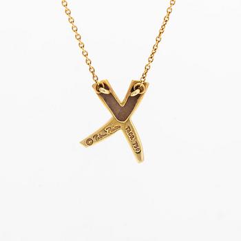 Tiffany & Co, Paloma Picasso, an 18K gold 'X Kiss' necklace.