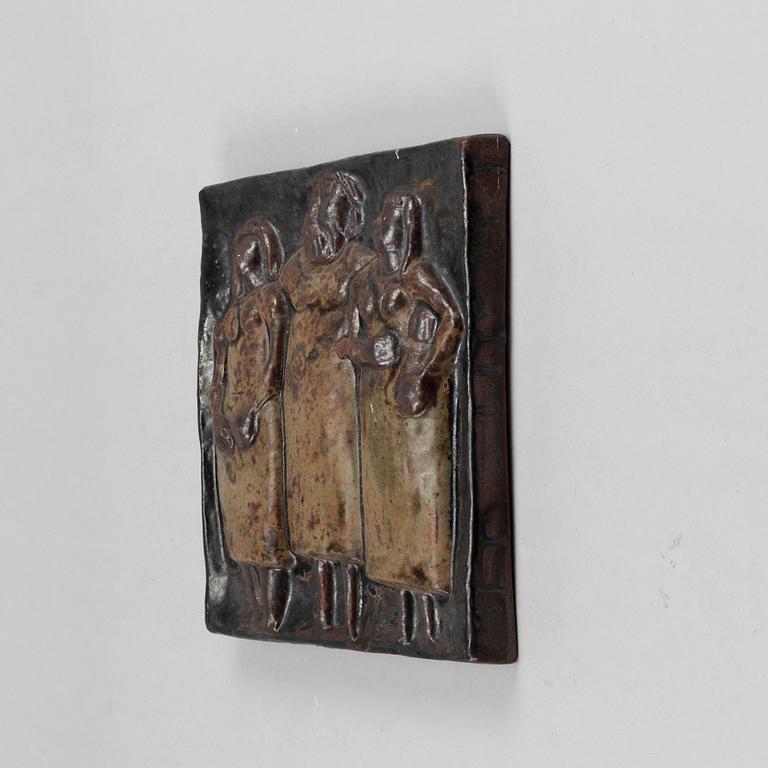 A stoneware wall relief by Åke Holm, signed.