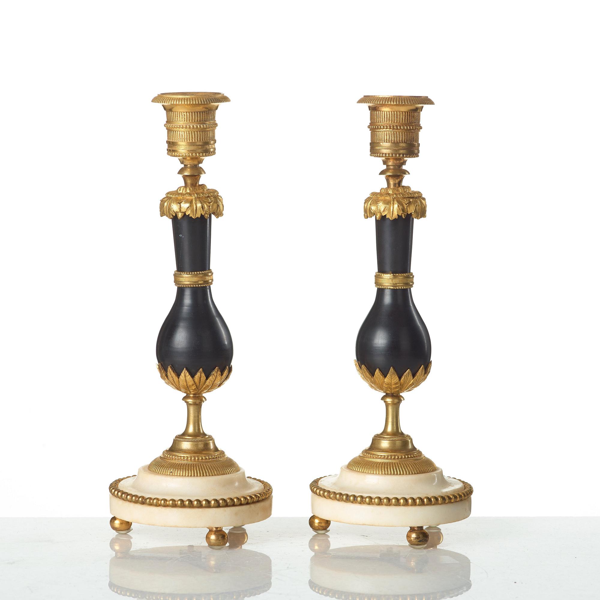 A pair of Louis XVI late 18th century candlesticks.