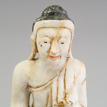 An alabaster figure of Buddha, probably Burma, 20th century.