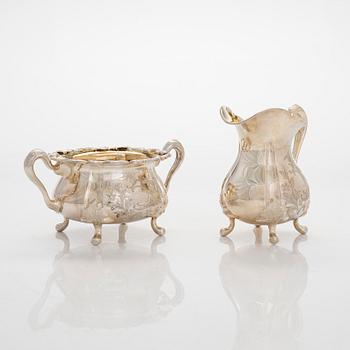 A three-piece silver coffee service and six coasters, Auran Kultaseppä Turku 1965-79.