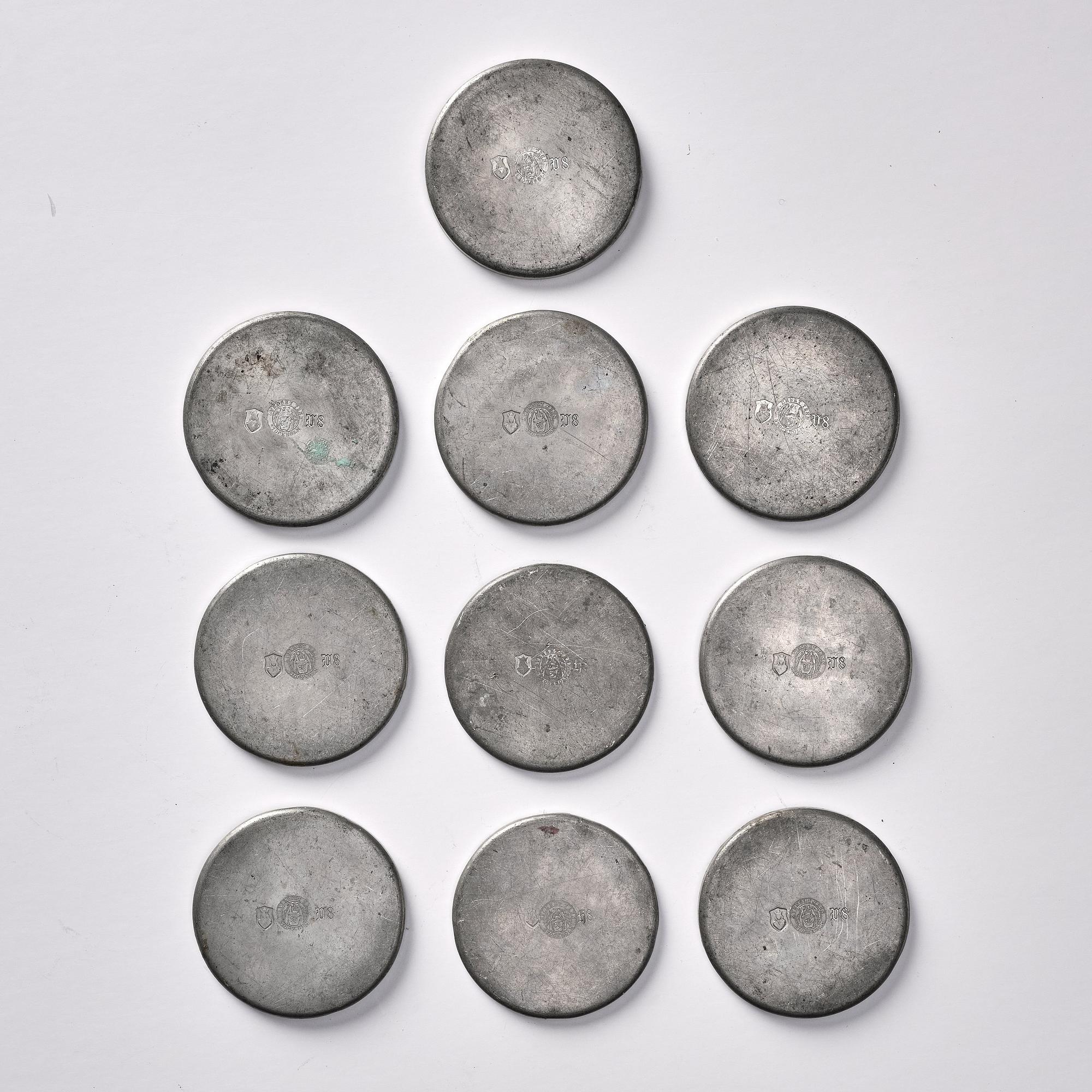 Firma Svenskt Tenn, a set of 10 pewter glass coasters, Svenskt Tenn Sweden 1934 ( 2) and 1946. Alva & Gunnar Myrdal Collection.