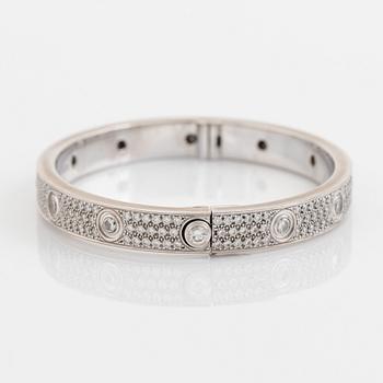 A Cartier "Love" bracelet in 18K white gold set with round brilliant-cut diamonds.