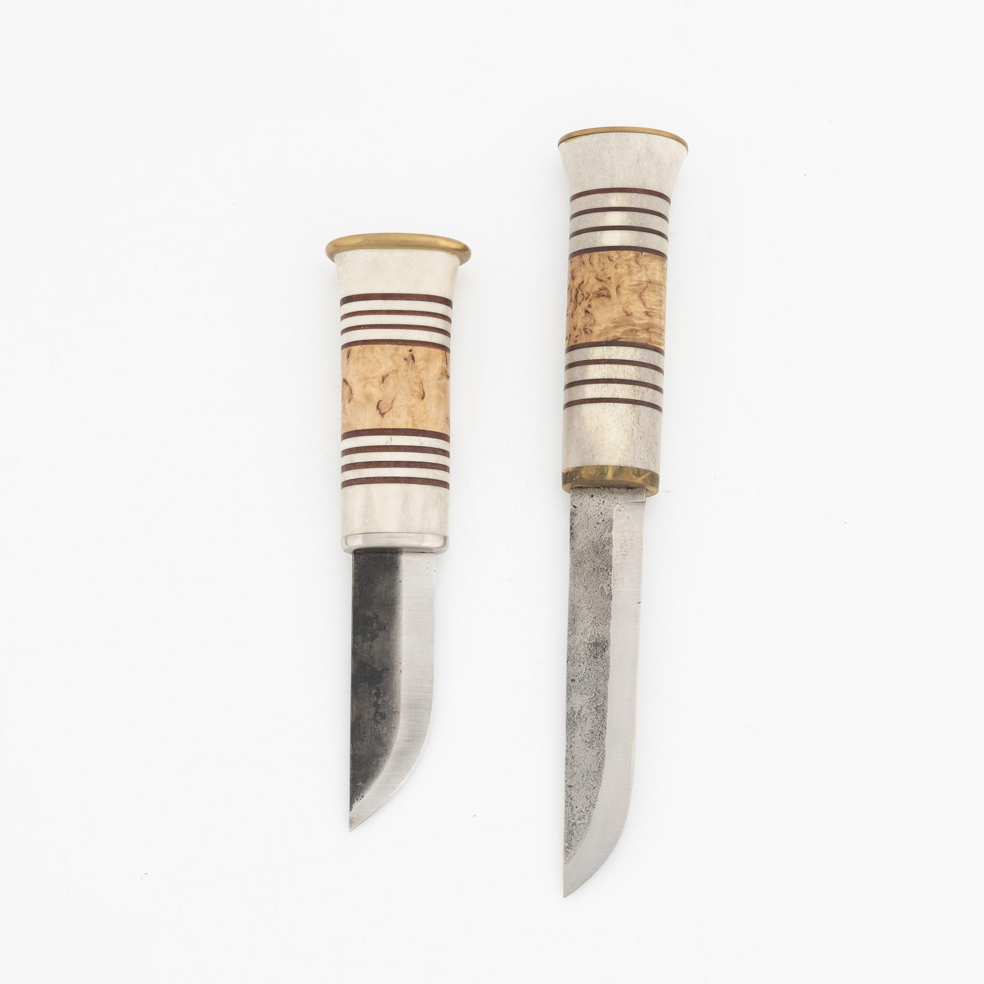 Two reindeer horn knives.