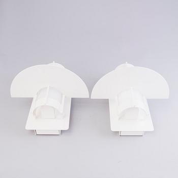 A pair of wall lights "Saturn" by Joachim Lepper for Louis Poulsen, Denmark.