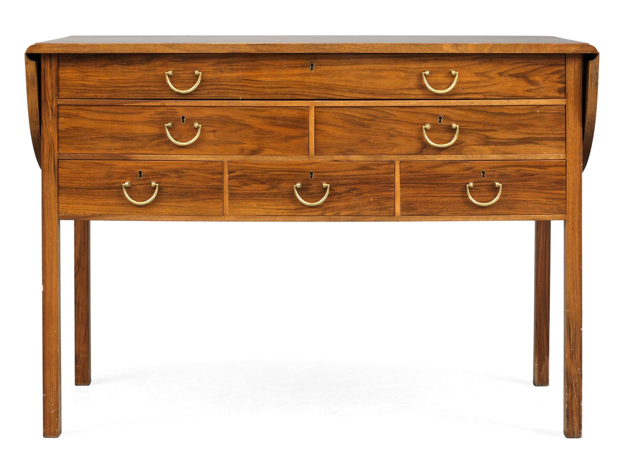 A Josef Frank walnut sideboard with a burr wood top by Firma Svenskt Tenn.