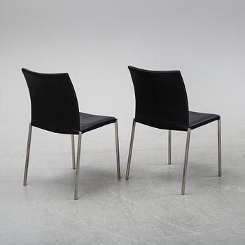 A set of eight steel and leather chairs, 21th century.