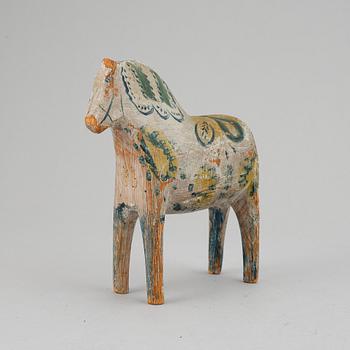 A painted Swedish wooden horse from around year 1900.