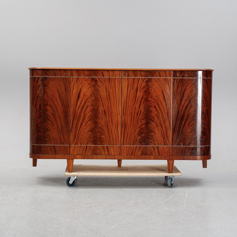 A mahogany veneered sideboard, Paul Persson & Söner, Möbelaffär, Karlstad, 1940's/50's.