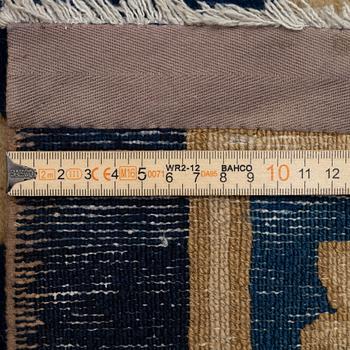 An antique Peking carpet, north China, c. 438 x 373 cm.