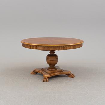 an oak dining table, first half of the 20th century.