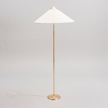 PAAVO TYNELL, A FLOOR LAMP. Manufactured by Taito/Idman.