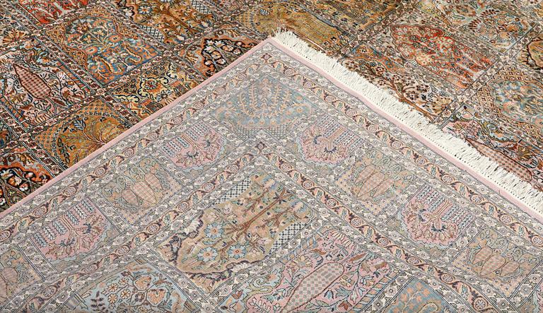 A Kashmir silk carpet, 418 x 297 cm.