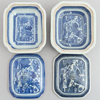 A pair of Chinese porcelain vegetable dishes with covers and two dishes, Qing dynasty, 18th and 19th century.