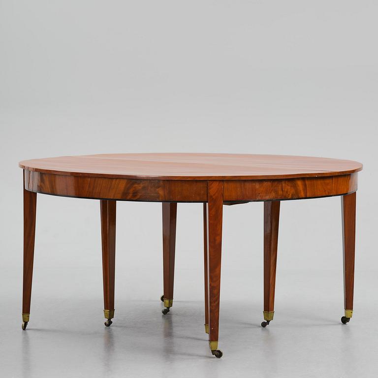 A George III mahogany D-end dining table, circa 1800.