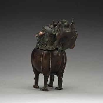 A bronze censer in the shape of a buddhist lion, Qing dynasty (1644-1912).