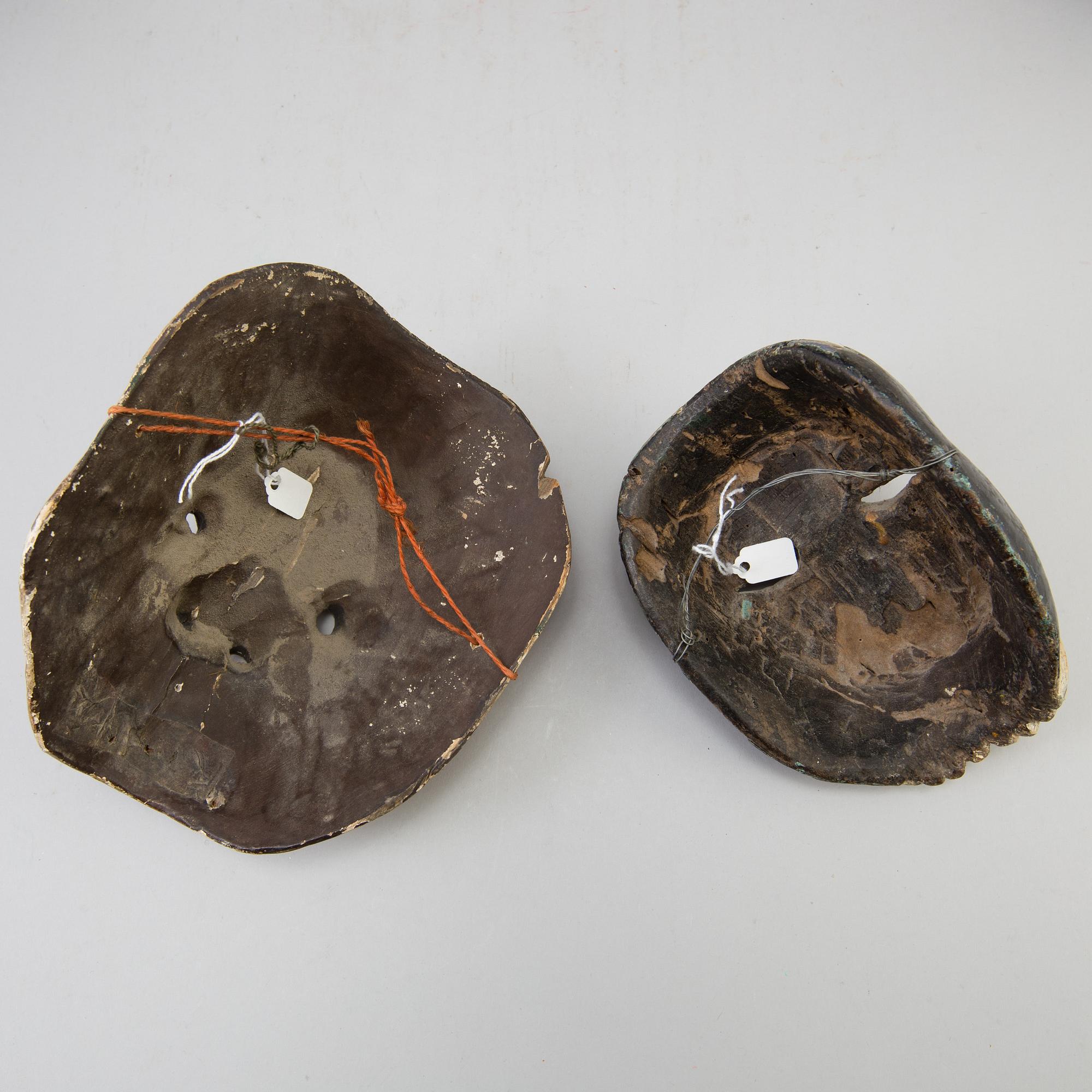 A group of dancing maskes, mostly Japanese Bugagku masks, Meiji period (1868-1912).
