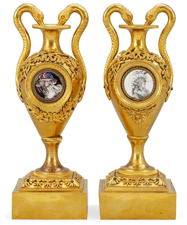 Two matched 19th century table urns.