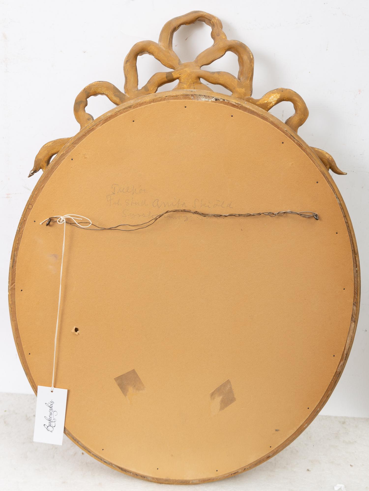 A Gustavian style mirror, early 20th Century.