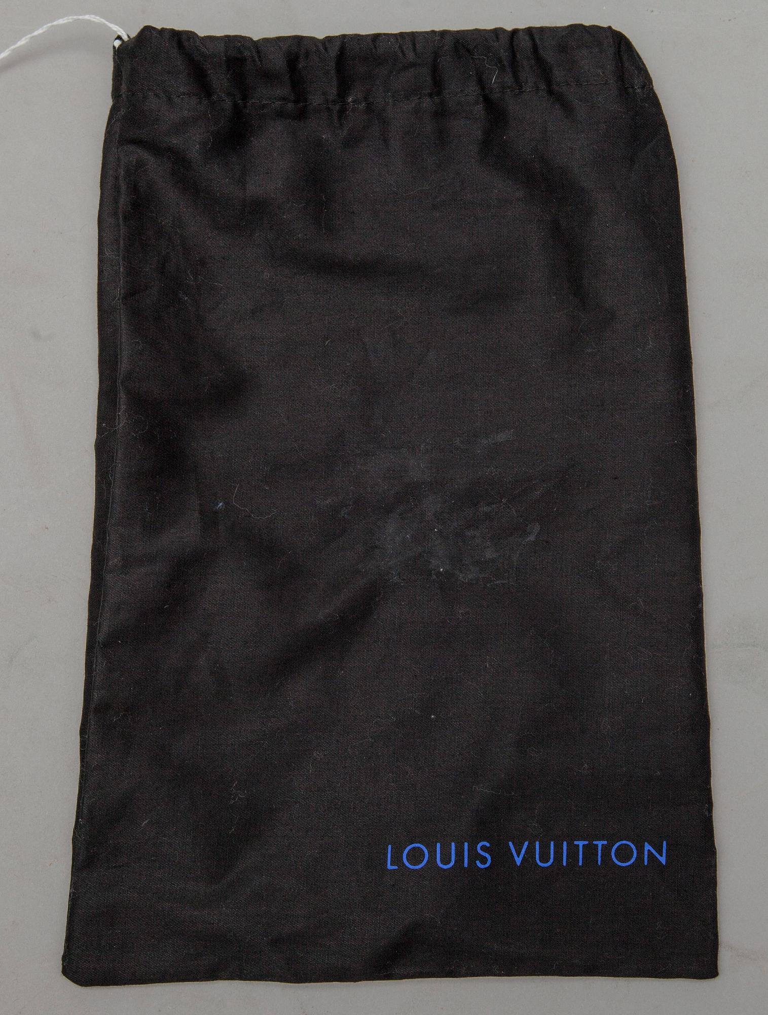SJAL, Louis Vuitton.