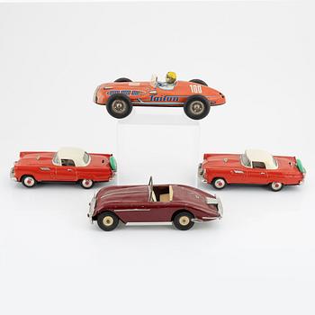Four toy cars, including Nomura Toys, Japan, 20th century.