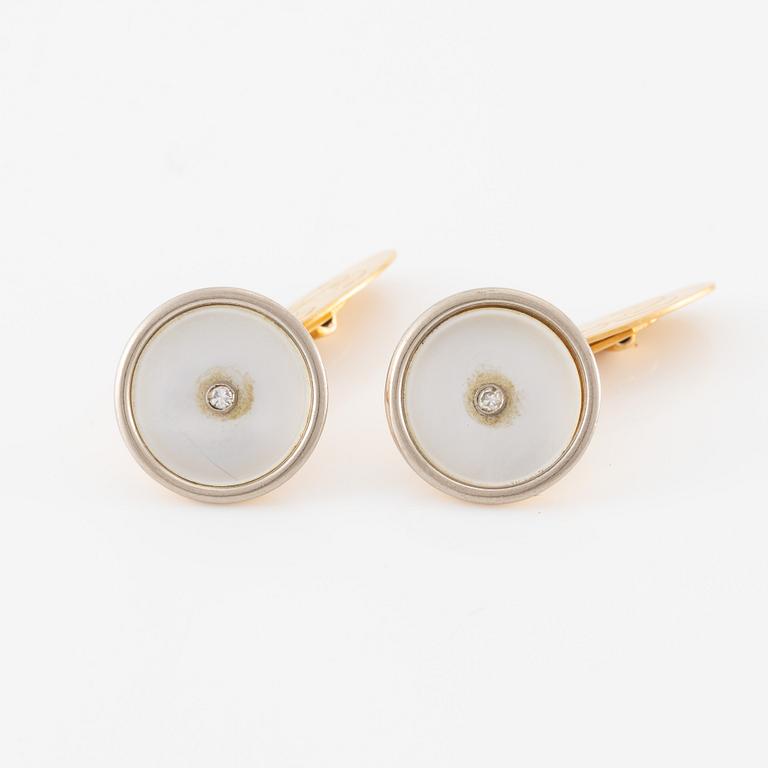 C.G Hallberg, cufflinks and shirt studs, two pairs, 18K gold with diamonds and mother-of-pearl.