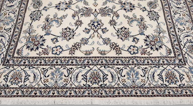 A part silk Nain carpet, ca 305 x 198 cm.