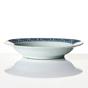 A blue and white 'floral' dish, Ming dynasty, Jiajing (1521-1566).