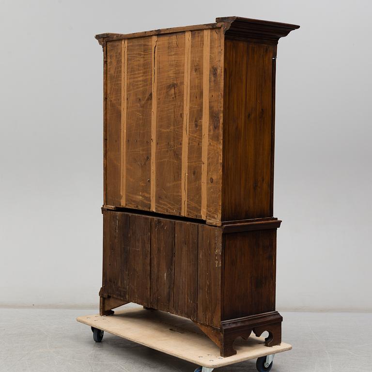 An 18th/19th century cabinet.