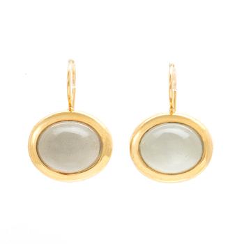 A pair of 18K gold earrings "Emeli" with cabochon-cut moonstone from Ole Lynggaard.