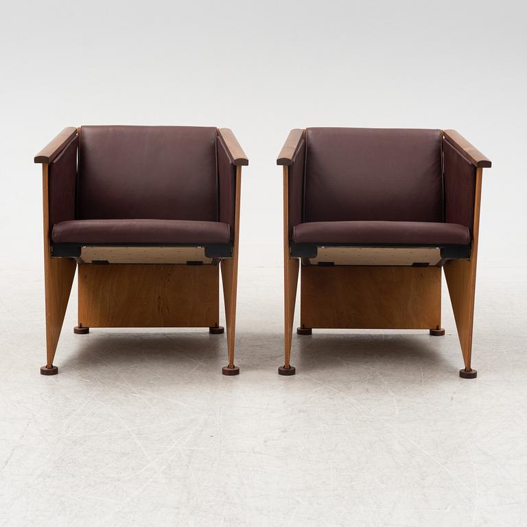 Torbjörn Ahlström, a pair of mahogany and cherry armchairs.