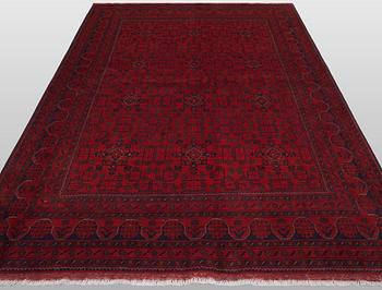 A Afghan carpet, 232 x 167 cm.