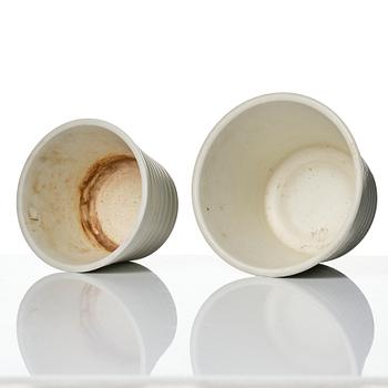 Wilhelm Kåge, A set of three ceramic flower pots, a vase and jar with lid,  Gustavsberg 1930s.