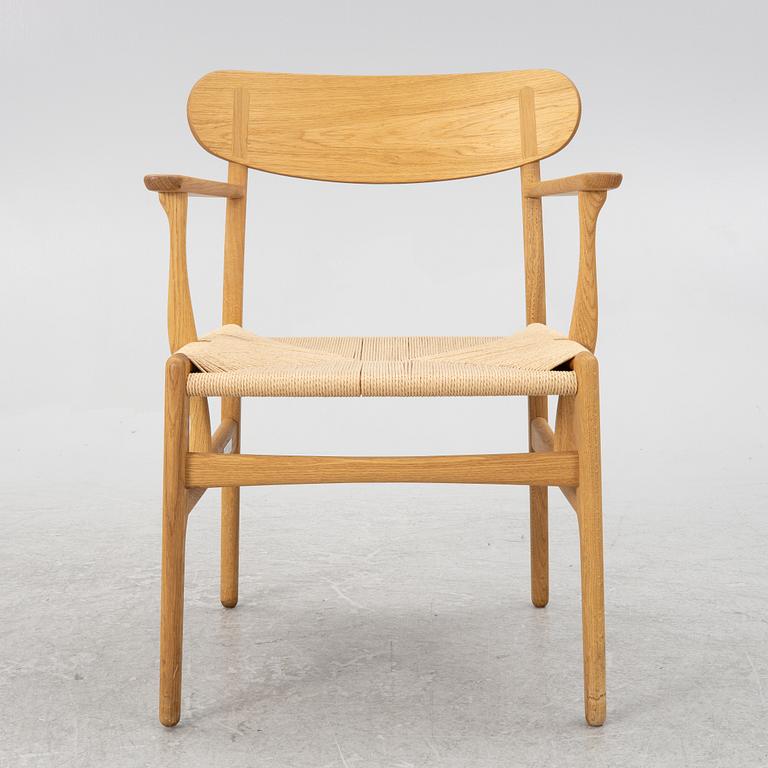 Hans J. Wegner, a CH26 chair, Carl Hansen & Son, Denmark, 21st century.