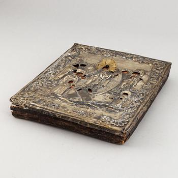 A russian icon with ochlad, rempera on panel, 19th Century.