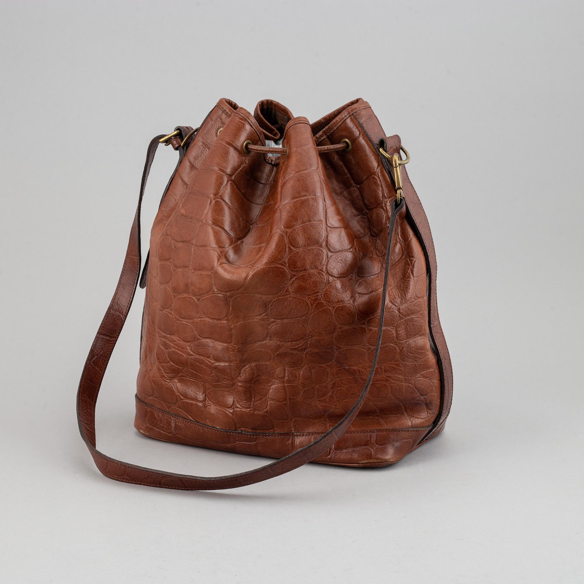 MULBERRY, a leather drawstring bag.