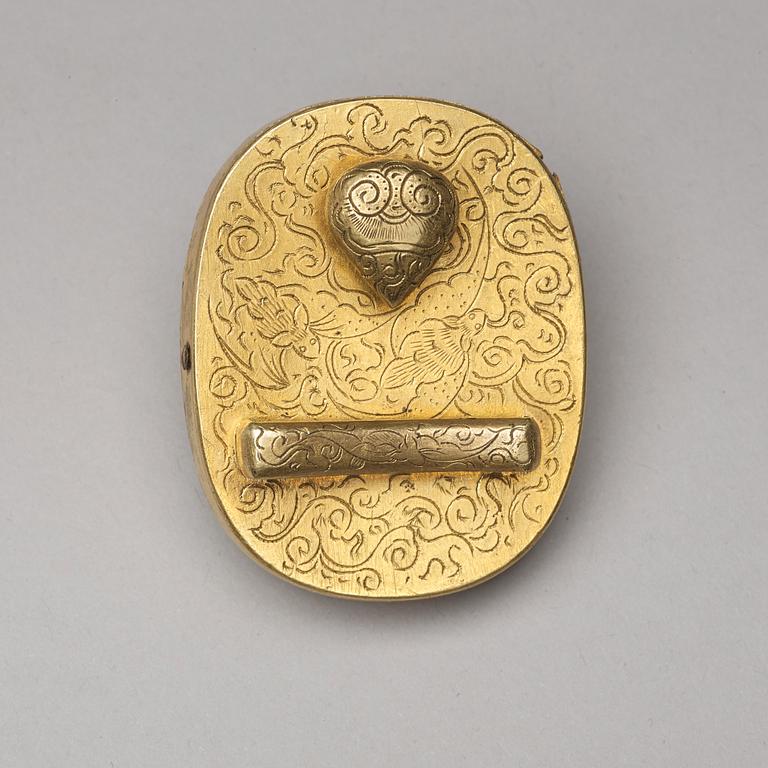 A gilt brass belt buckle, Qing dynasty, 19th Century.