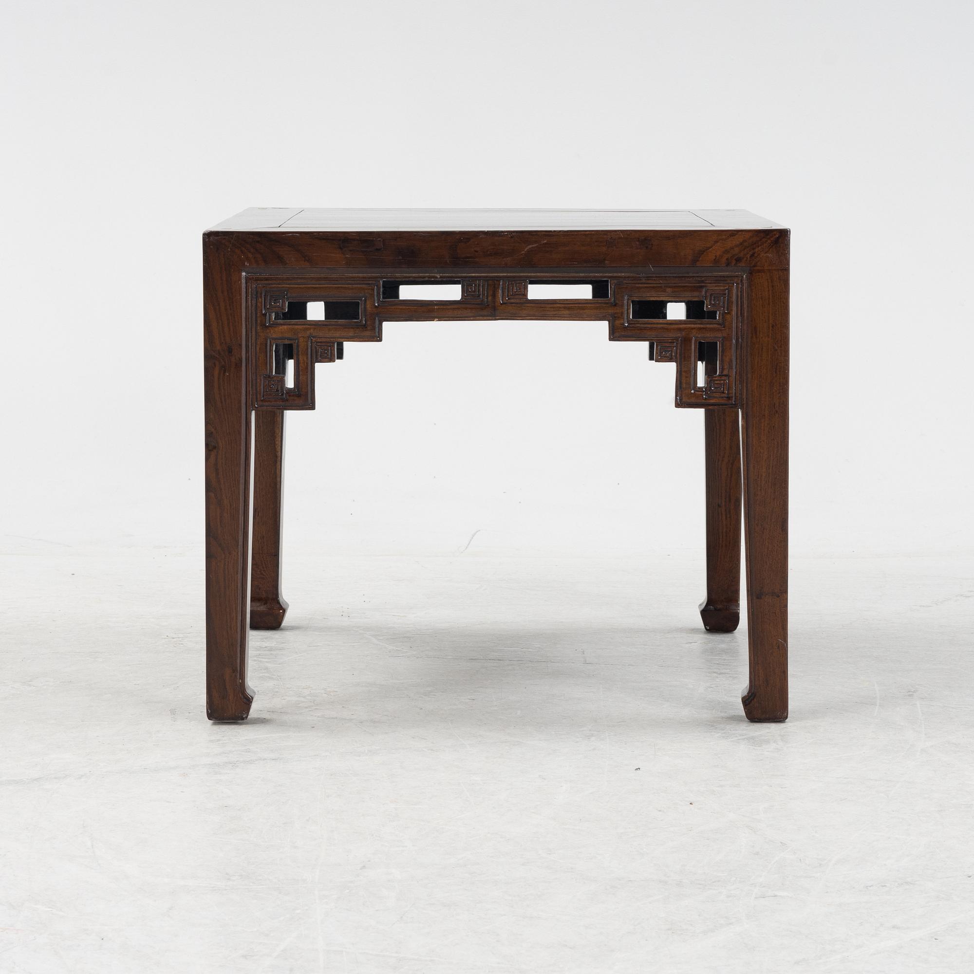 A Chinese hardwood table, presumably late Qing dynasty, circa 1900.