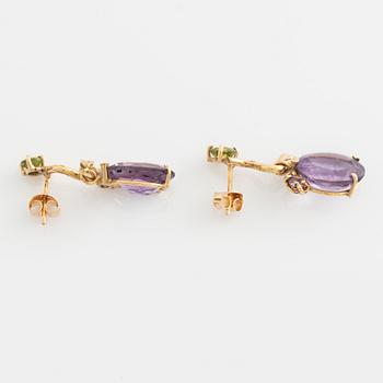 Earrings with oval amethysts, peridot, tourmaline, and small diamonds.