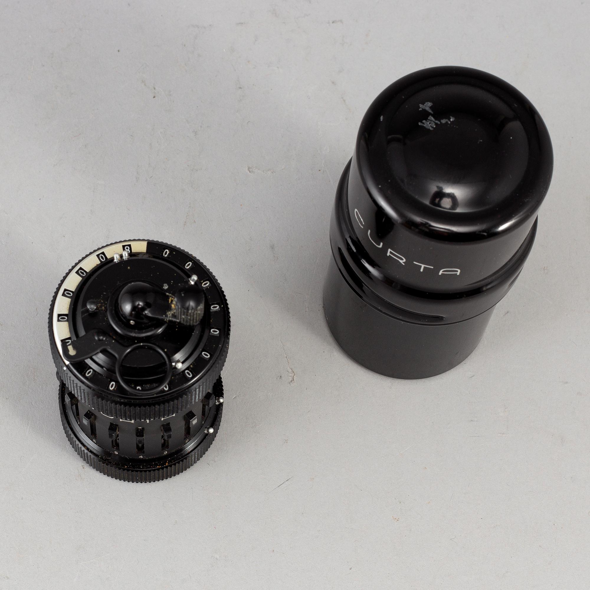 A 'Curta, Type I' calculator developed by Curt Herzstark, Contina AG Mauren, Lichtenstein, designed in 1947.